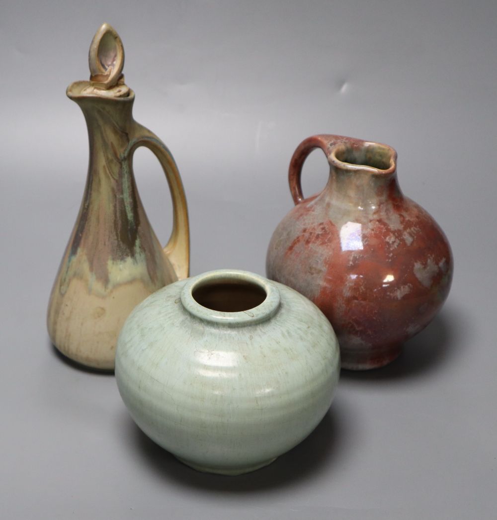 Three items of Art Pottery, including a stoneware ewer and stopper,